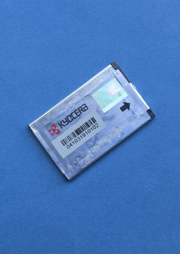 Оригінальна батарея Kyocera TXBAT10159 з розбирання (B+ сток) ємність 75-80%