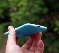 Крышка Motorola Moto X бирюзовая - на белом телефоне