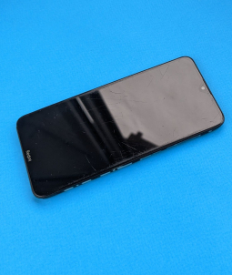 Дисплей (екран) в рамці Xiaomi Redmi 8a чорний оригінал (C-сток) подряпини