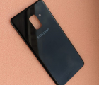 Кришка Samsung Galaxy A8 (2018) оригінал з розборки (A-сток) чорна